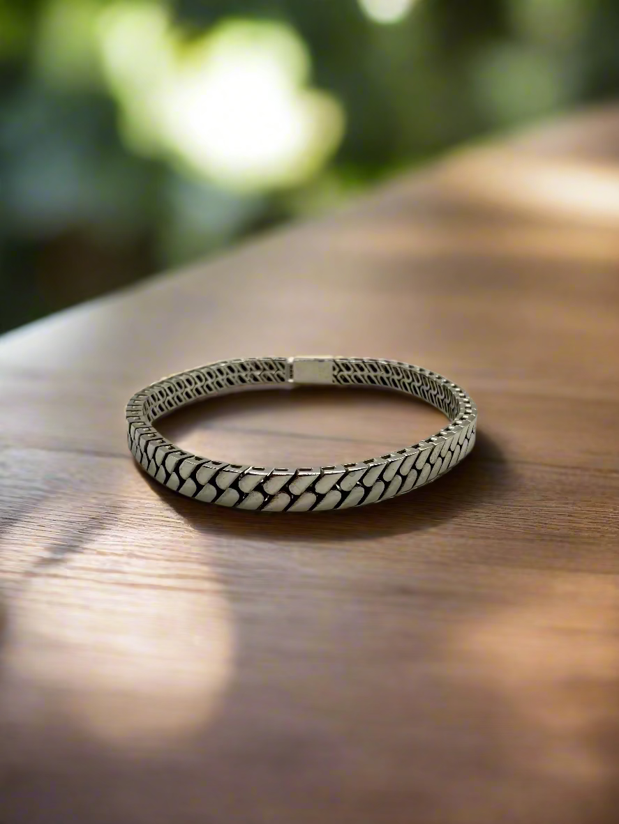 Brǎțarǎ împletitǎ